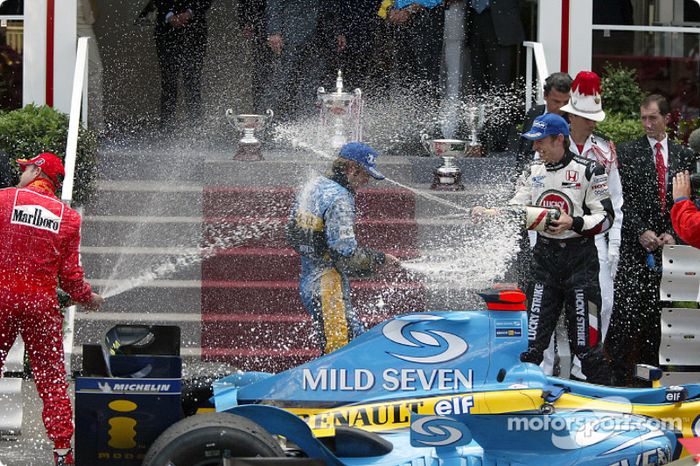 Podio: champagne para Jarno Trulli, Jenson Button y Rubens Barrichello