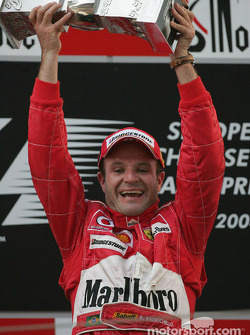 Podium: race winner Rubens Barrichello celebrates
