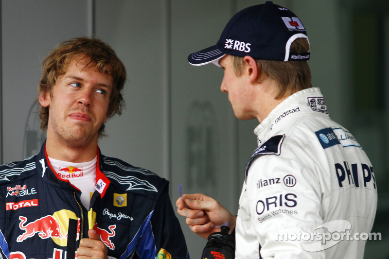 Pole winner Nico Hulkenberg, Williams F1 Team, with second place Sebastian Vettel, Red Bull Racing