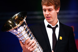 FIA Formula One World Champion Sebastian Vettel with the Drivers' trophy