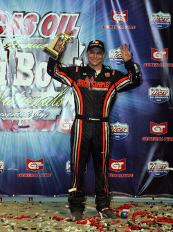 Kevin Swindell celebrates winning the 26th Lucas Oil Chili Bowl