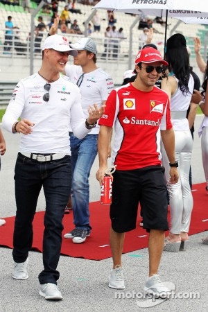 Michael Schumacher, Mercedes GP with Felipe Massa, Ferrari on the drivers parade
