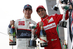 Kamui Kobayashi, Sauber celebrates his third position on the podium with second placed Felipe Massa, Ferrari