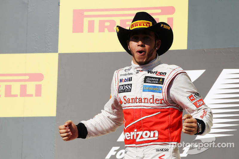 Race winnaar Lewis Hamilton, McLaren celebrates op het podium