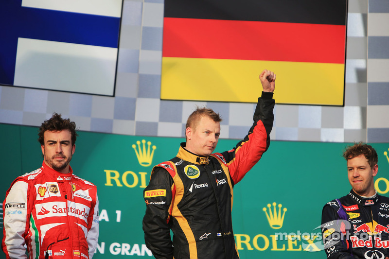 The podium, Ferrari, second; Kimi Raikkonen, Lotus F1 Team, race winner; Sebastian Vettel, Red Bull Racing, third