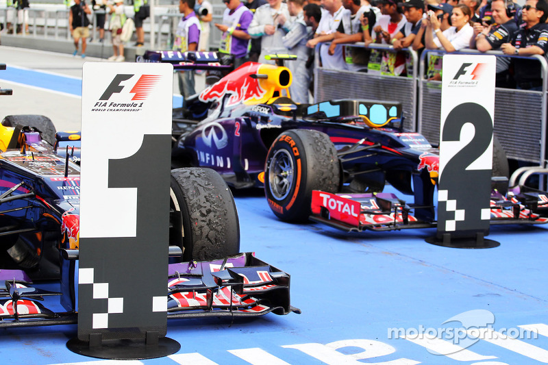 The Red Bull Racing RB9s of race winner Sebastian Vettel, Red Bull Racing and team mate Mark Webber, Red Bull Racing in parc ferme.