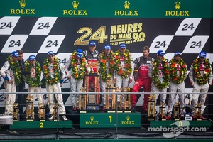 LMP1 podium: class and overall winners Tom Kristensen, Allan McNish, Loic Duval, second place Anthony Davidson, Stéphane Sarrazin, Sebastien Buemi, third place Marc Gene, Oliver Jarvis, Lucas di Grassi