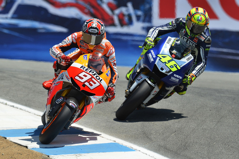 Marc Marquez, Repsol Honda Team passes Valentino Rossi, Yamaha Factory Racing