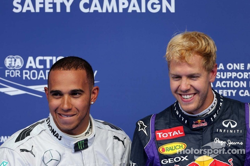 Lewis Hamilton, Mercedes Grand Prix y Sebastian Vettel, Red Bull Racing