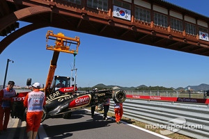 The Lotus F1 E21 of Kimi Raikkonen, Lotus F1 Team is recovered back to the pits on the back of a truck after he crashed at the end of the first practice session