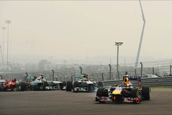Sebastian Vettel, Red Bull Racing RB9 leads at the start of the race