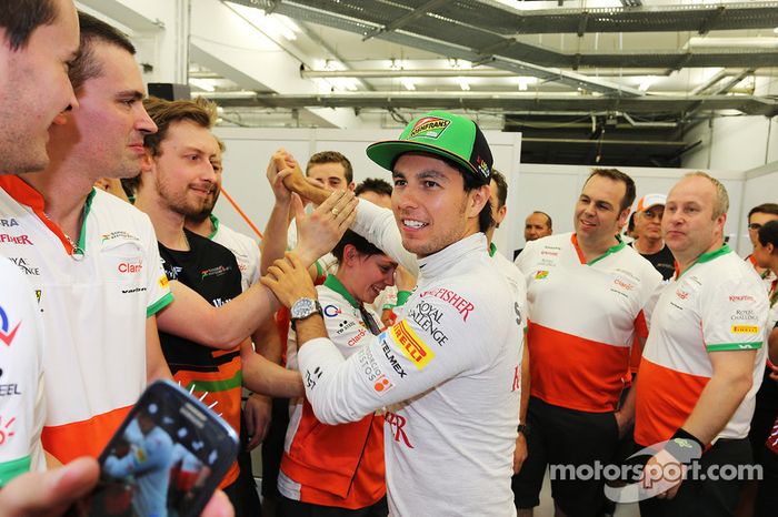 Sergio Perez, Sahara Force India F1 celebrates his third position with the team