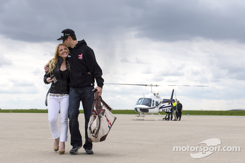 Kurt Busch travels with girlfriend Patricia Driscoll back to Charlotte Motor Speedway from Indianapolis