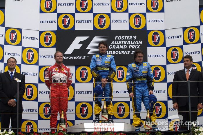 Podio: ganador de la carrera Giancarlo Fisichella con Rubens Barrichello y Fernando Alonso
