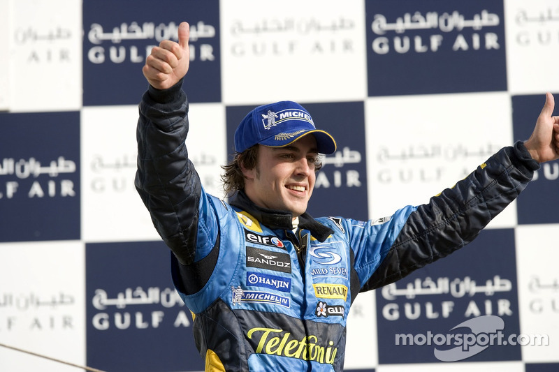 Podium: race winner Fernando Alonso celebrates