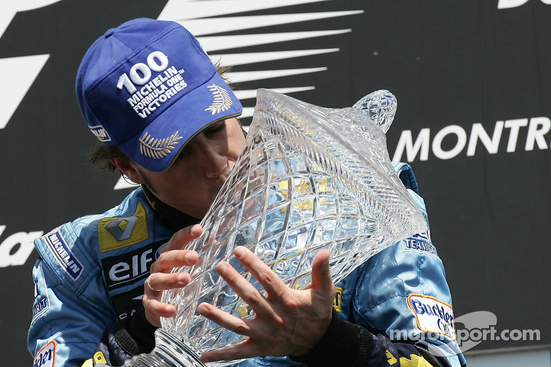 Podium: race winner Fernando Alonso celebrates