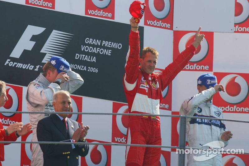 Podium: race winner Michael Schumacher with Kimi Raikkonen and Robert Kubica