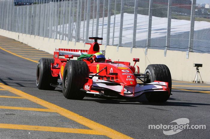 Race winner Felipe Massa celebrates