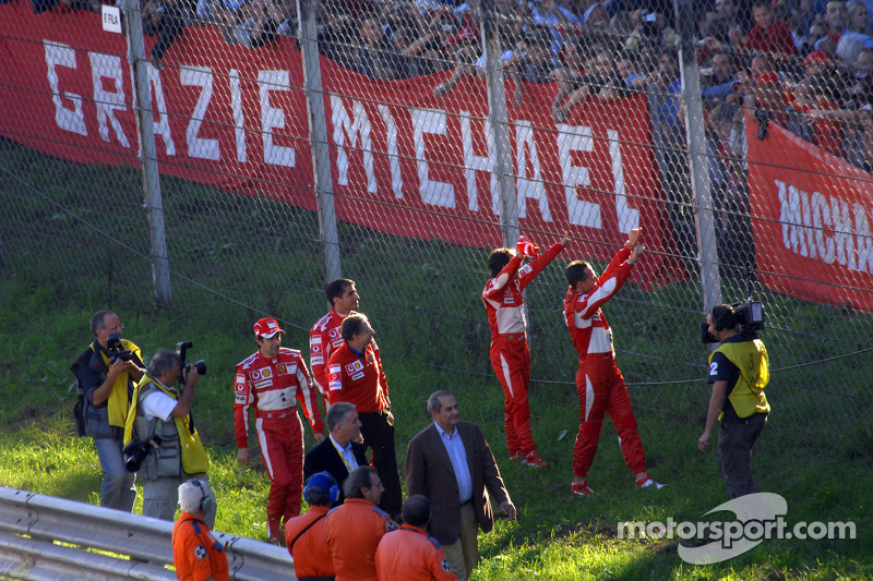 Marc Gene, Luca Badoer, Michael Schumacher and Felipe Massa wave to the crowd