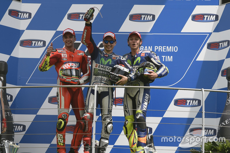 Podium: second place Andrea Iannone, Ducati Team and winner Jorge Lorenzo and third place Valentino 