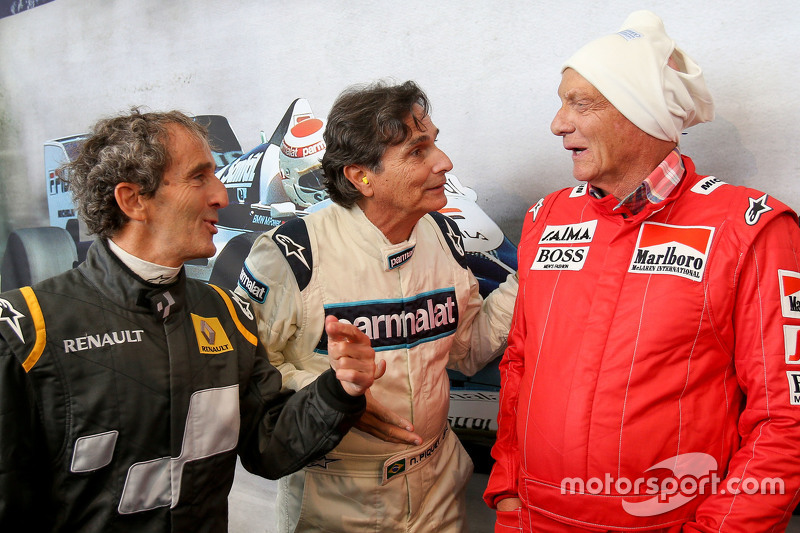 Alain Prost, with Nelson Piquet, and Niki Lauda, Mercedes Non-Executive Chairman at the Legends Parade