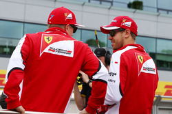Kimi Raikkonen, Ferrari avec Sebastian Vettel, Ferrari lors de la parade des pilotes