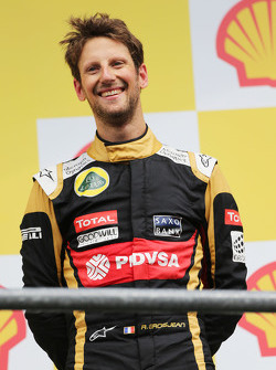 Romain Grosjean, Lotus F1 Team fête sa troisième place sur le podium