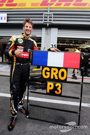 Romain Grosjean, de Lotus F1 Team celebra su tercera posición con el equipo
