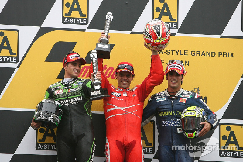 Podium: race winner Loris Capirossi with Randy De Puniet and Toni Elias