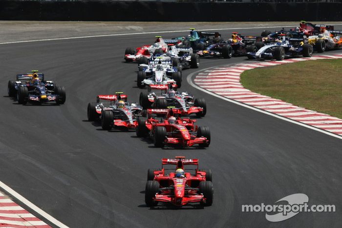 Salida: Felipe Massa, Scuderia Ferrari, F2007, Kimi Raikkonen, Scuderia Ferrari, F2007 y Lewis Hamil