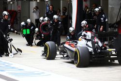 Jenson Button, McLaren MP4-30 makes a pit stop