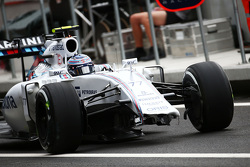 Valtteri Bottas, Williams FW37 with a missing front wing and damaged nosecone after he crashed in the second practice session
