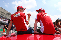 Sebastian Vettel, Ferrari with Kimi Raikkonen, Ferrari on the drivers parade.