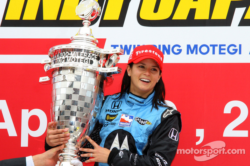 Podium: race winner Danica Patrick celebrates