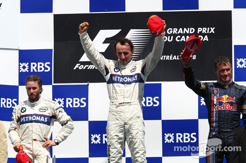 Podium: winnaar Robert Kubica met Nick Heidfeld en David Coulthard