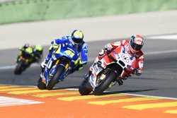 Andrea Dovizioso, Ducati Team and Aleix Espargaro, Team Suzuki MotoGP