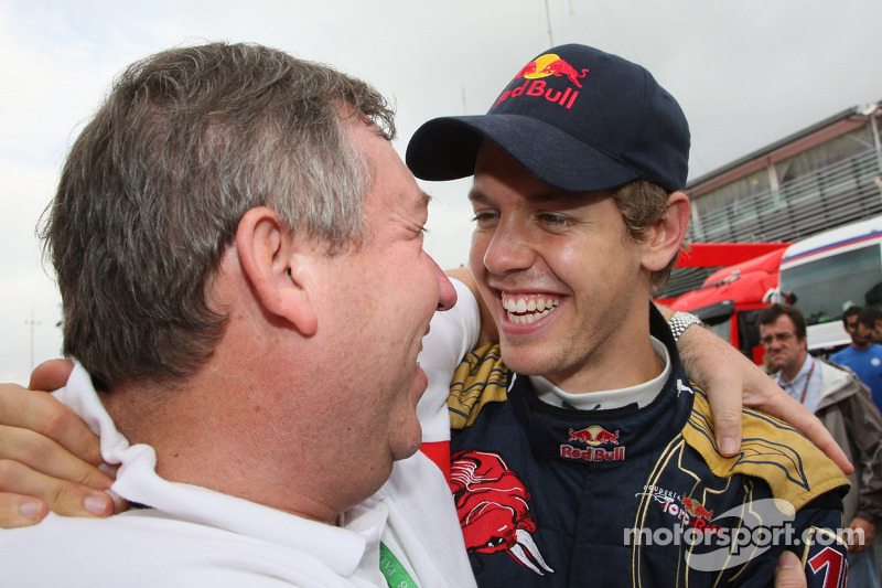 Pole winner Sebastian Vettel celebrates