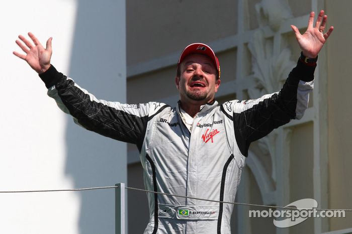 Podium: race winner Rubens Barrichello, BrawnGP celebrates