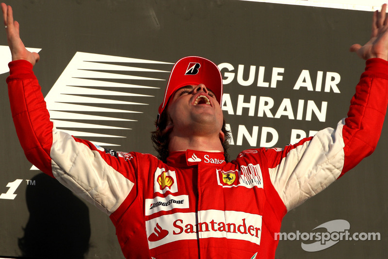 Podium: race winner Fernando Alonso, Scuderia Ferrari celebrates