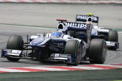 Rubens Barrichello, Williams F1 Team leads Nico Hulkenberg, Williams F1 Team